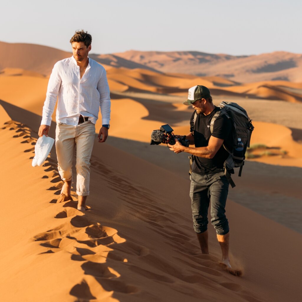 Antoine Janssens filming client in desert