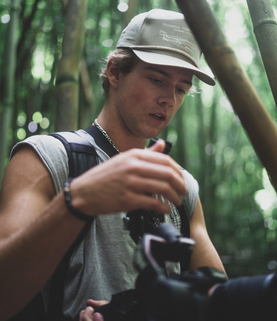 Luke Berg filming in jungle