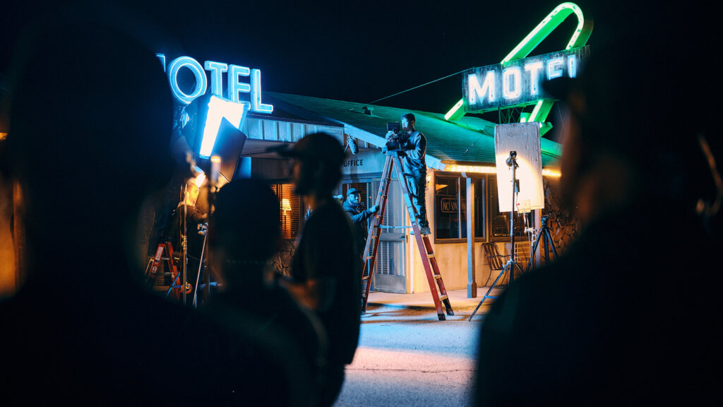 Ryan Kao filming in front of motel