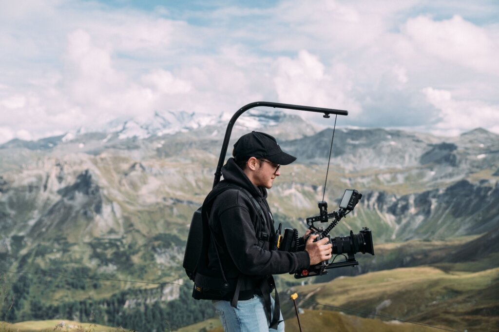 Tobi Wögerer filming in mountains