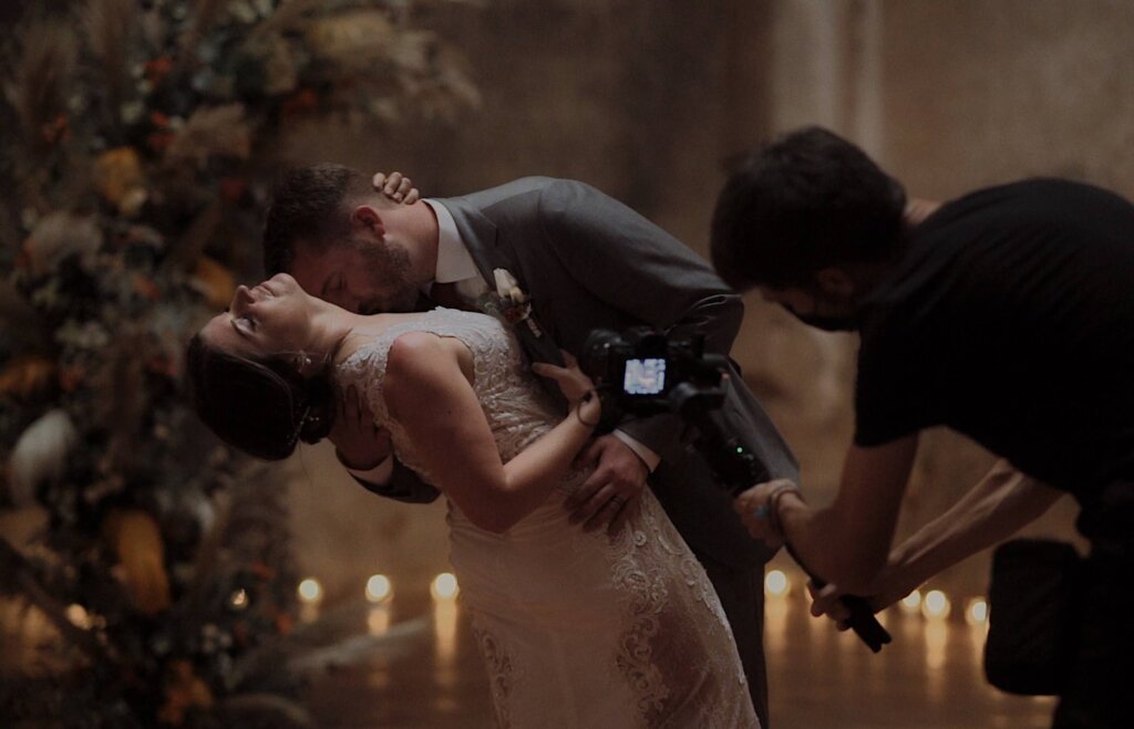 Rodrigo Zadro capturing couple at wedding