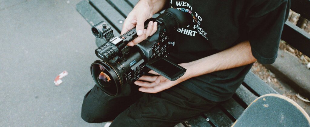 Filmmaker holding a camera