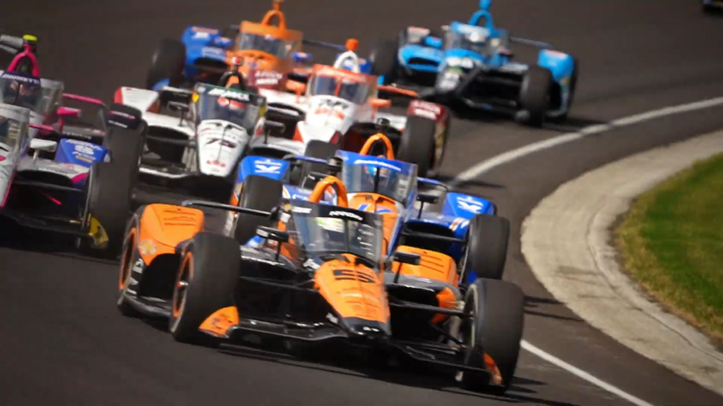 Still taken from "Michael Strahan Knows Speed, Power, and the Indy 500."