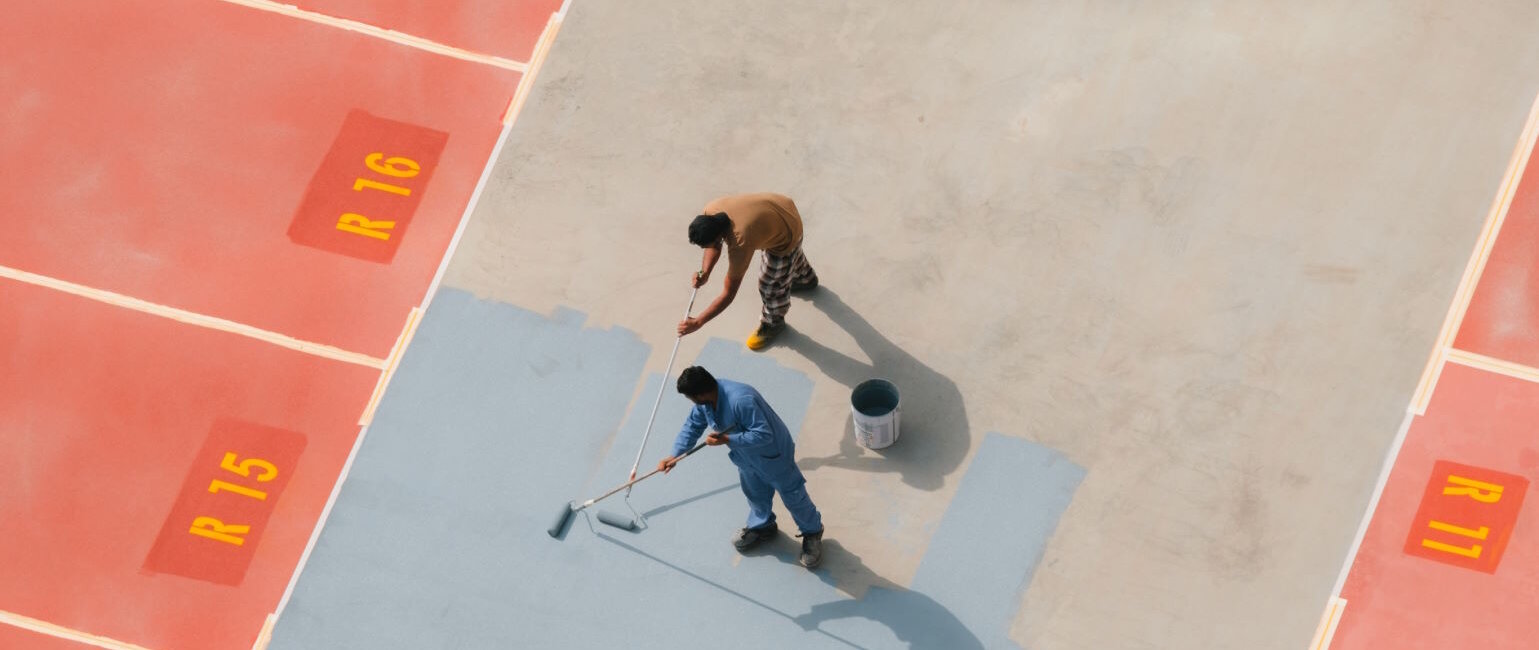 Color Choice in Storytelling - People Painting a Colorful Street