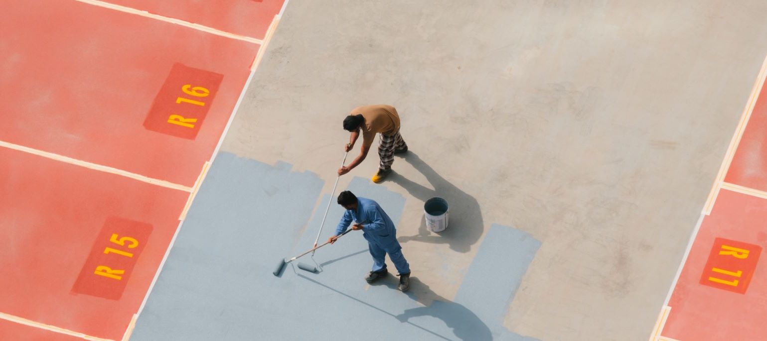 Color Choice in Storytelling - People Painting a Colorful Street