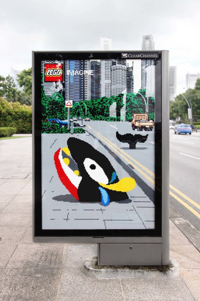 IMAGINE WINDOWS Campaign by David Stevanov

Poster built from legos. Black, white, and red whale emerging from city sidewalk.