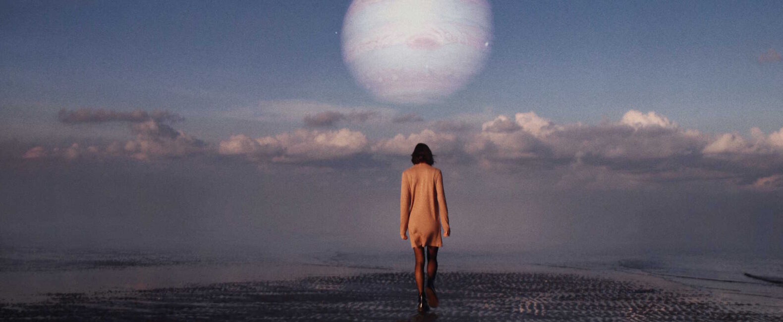 Woman Walking Abstractly With Clouds And A Planet On The Horizon